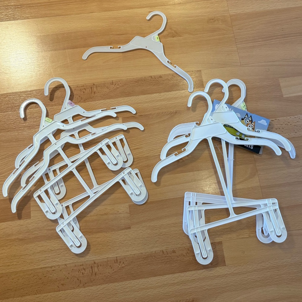 Set of White Plastic Hangers